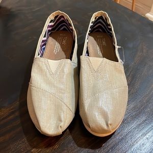 TOMS slip ons
